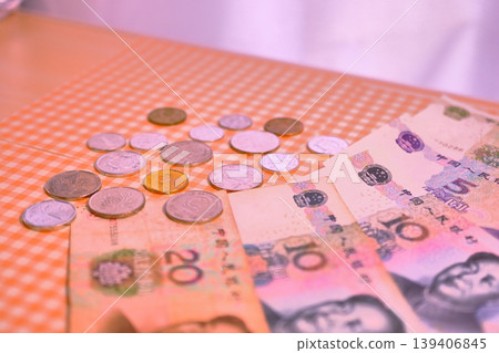 Chinese yuan banknotes and coins Chinese yuan banknotes and coins 139406845