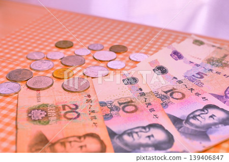 Chinese yuan banknotes and coins Chinese yuan banknotes and coins 139406847