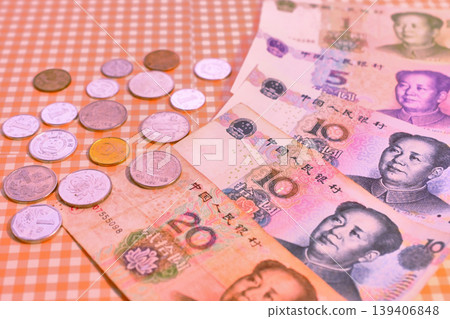 Chinese yuan banknotes and coins Chinese yuan banknotes and coins 139406848