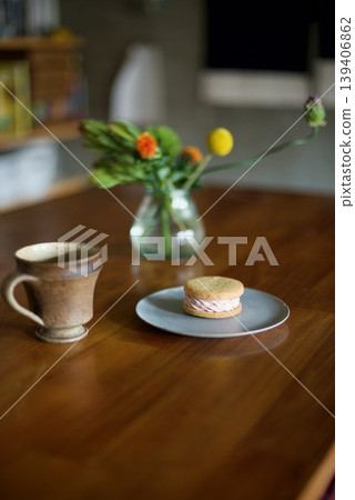Hot coffee and a butter sandwich for a snack. Hot coffee and a butter sandwich for a snack. 139406862