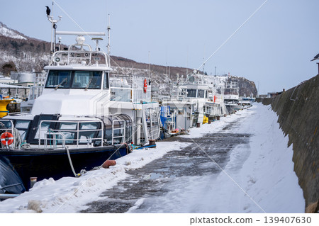 A scene from a fishing port in the middle of winter A scene from a fishing port in the middle of winter 139407630