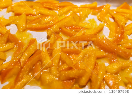 Top view of homemade candied orange peels drying Top view of homemade candied orange peels drying 139407998