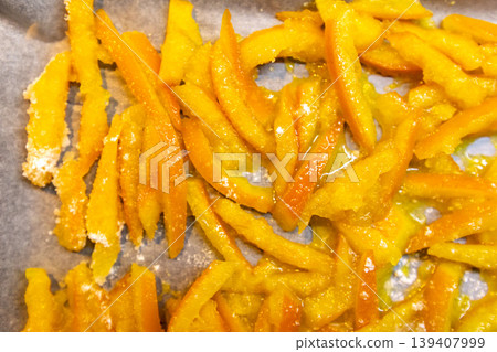 Top view of homemade candied orange peels drying Top view of homemade candied orange peels drying 139407999