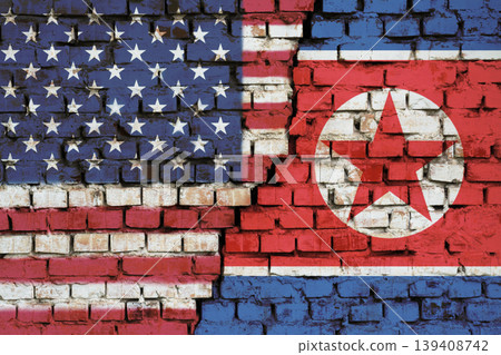 Flags of USA and North Korea on the brick wall with big crack in the middle. Symbol of problems between countries Flags of USA and North Korea on the brick wall with big crack in the middle. Symbol of problems between countries 139408742