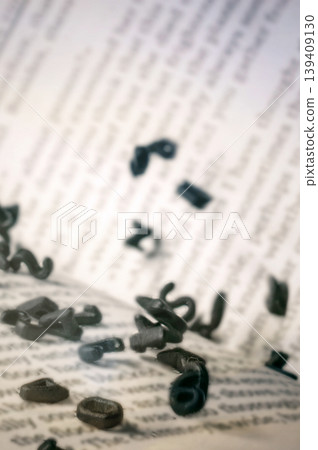 Open Book with Falling Black Letters. Knowledge and Education Concept Open Book with Falling Black Letters. Knowledge and Education Concept 139409130