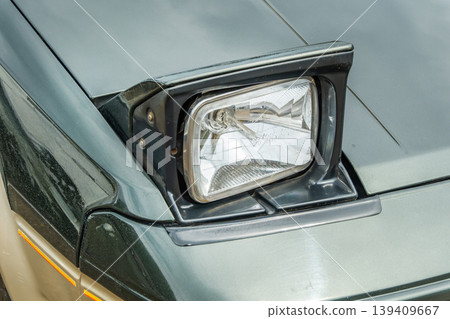 Headlight of the old car 139409667