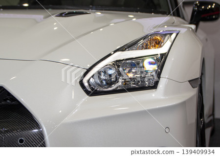 White car headlights White car headlights 139409934