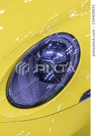 Yellow car headlights 139409935