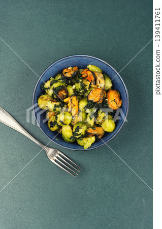 Brussels sprouts with mussels on a plate Brussels sprouts with mussels on a plate 139411761