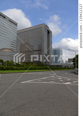 A cluster of buildings around Makuhari New City in Chiba Prefecture against the summer sky. 139412127