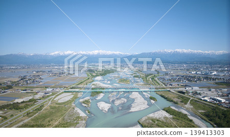A view from around the mouth of the Kurobe River in May, the rice planting season. 139413303