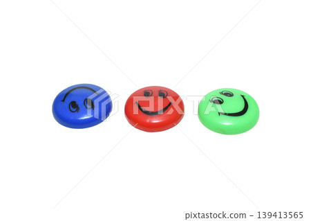 Decorative fridge magnets in the shape of smiley faces. Decorative fridge magnets in the shape of smiley faces. 139413565