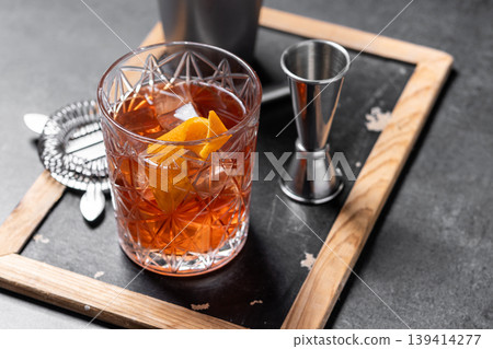 Old Fashioned Cocktail with Orange Peel on black background 139414277