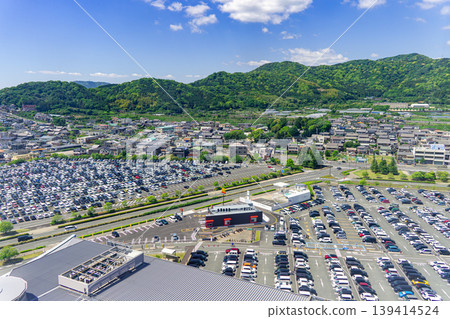 An aerial view of the entire, full parking lot at Laguna Gamagori. An aerial view of the entire, full parking lot at Laguna Gamagori. 139414524