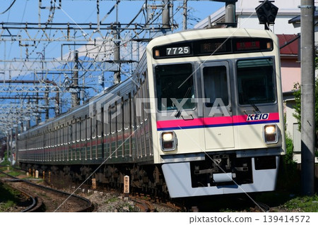 Keio 7000 series 7725F running with Mount Fuji in the background. Keio 7000 series 7725F running with Mount Fuji in the background. 139414572