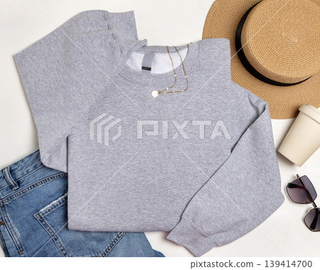 Blank sport grey unisex sweatshirt mockup, apparel flat lay with copy space on front and sleeve Blank sport grey unisex sweatshirt mockup, apparel flat lay with copy space on front and sleeve 139414700