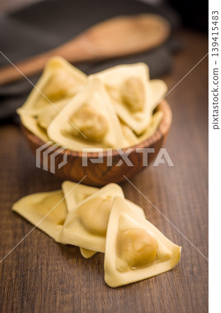 Fresh Uncooked Ravioli Pasta On Wooden Table With Bowl, Homemade Italian Dumplings 139415483