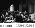 Female speaker giving a talk on corporate business conference. Unrecognizable people in audience at conference hall. Business and Entrepreneurship event 139415894
