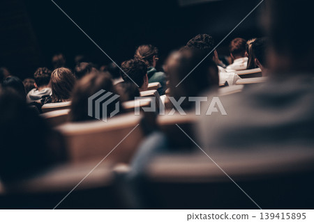 Rear view of unrecognizable people in audience at the conference hall. Business and entrepreneurship symposium 139415895