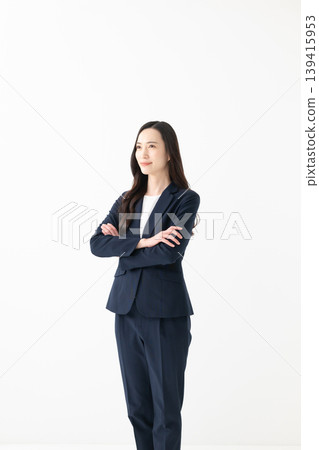 Businesswoman making arms Businesswoman making arms 139415953