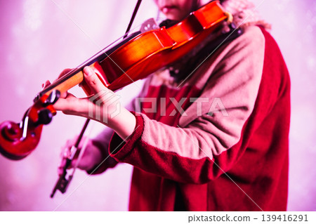 Woman playing the violin: From the left, pink Woman playing the violin: From the left, pink 139416291