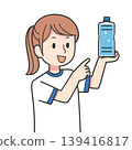 A woman pointing at a plastic bottle. 139416817