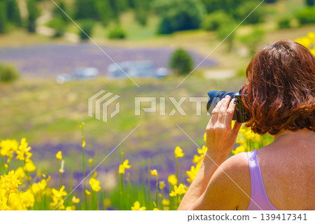 Tourist woman take photo on lavender field, Provence France 139417341