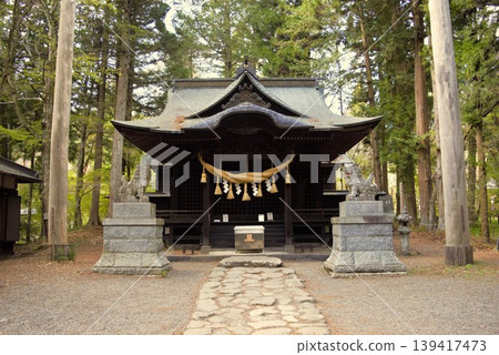 The main hall of a quiet shrine surrounded by forest The main hall of a quiet shrine surrounded by forest 139417473