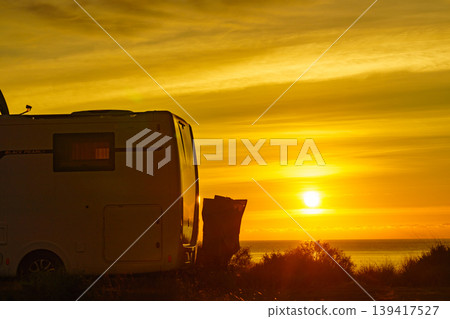 Caravan on sea at sunrise. Caravan on sea at sunrise. 139417527