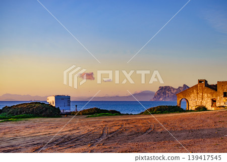 Caravan on spanish coast, Gibraltar rock on horizon Caravan on spanish coast, Gibraltar rock on horizon 139417545
