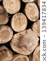 Pile of wood logs, closeup of clean cut of chopped firewood logs. Natural wooden background 139417834