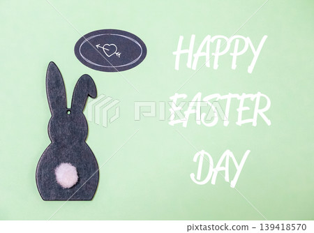 Rabbit is on a green background with a heart and an arrow Rabbit is on a green background with a heart and an arrow 139418570