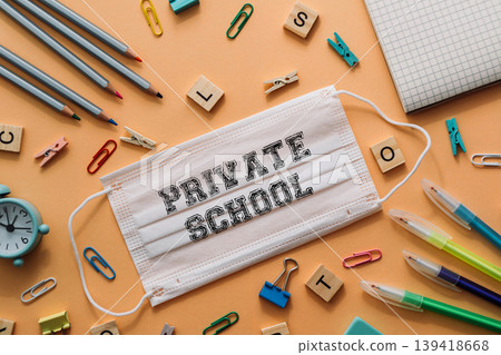 White mask with the word Private School written on it White mask with the word Private School written on it 139418668