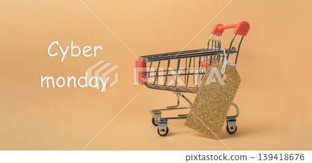 Shopping cart with golden tag on pastel background, symbolizing Cyber Monday sales and promotions Shopping cart with golden tag on pastel background, symbolizing Cyber Monday sales and promotions 139418676