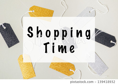 Colorful shopping tags in various shapes and sizes, featuring glittery textures, arranged artistically on a light background, conveying a festive shopping atmosphere Colorful shopping tags in various shapes and sizes, featuring glittery textures, arranged artistically on a light background, conveying a festive shopping atmosphere 139418932