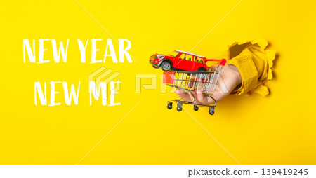 a shopping cart with the words New Year, New Me written below 139419245