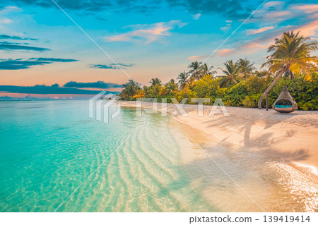 Breathtaking sunset beach tropical landscape with exotic ocean bay sandy shore and palm trees under a dreamy sunlight sky clouds dream vacation wallpaper 139419414