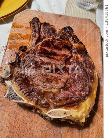 Txuleton Beef Steak on Grill with Juicy Texture Txuleton Beef Steak on Grill with Juicy Texture 139419561
