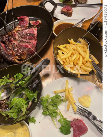Txuleton Beef Steak on Grill with Juicy Texture Txuleton Beef Steak on Grill with Juicy Texture 139419572