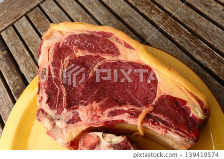Txuleton Beef Steak on Grill with Juicy Texture Txuleton Beef Steak on Grill with Juicy Texture 139419574