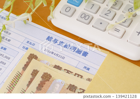 A pay slip that evokes the image of payday. A pay slip that evokes the image of payday. 139421128