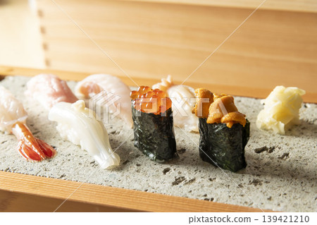 Nigiri sushi with sea urchin and salmon roe Nigiri sushi with sea urchin and salmon roe 139421210