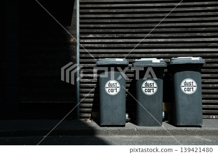 Urban Geometric: Geometric landscapes created by wood-grain walls and dustbins Urban Geometric: Geometric landscapes created by wood-grain walls and dustbins 139421480