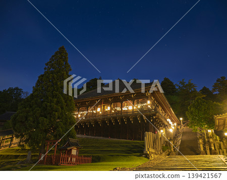 The light of prayer shines brightly in the starry sky at Todai-ji Temple's Nigatsu-do Hall. The light of prayer shines brightly in the starry sky at Todai-ji Temple's Nigatsu-do Hall. 139421567