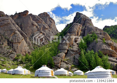 Rocky mountains and yurts at Bubeit Camp, Mongolia 139421864