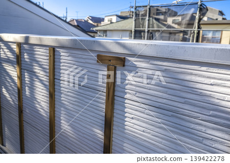 Exterior wall underlayment construction for a detached house - immediately after the start of renovation work. Exterior wall underlayment construction for a detached house - immediately after the start of renovation work. 139422278