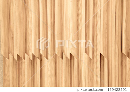 Modern interior wall detail with vertical light oak wooden slats. Decorative wood paneling with creative overlapping zigzag joinery. Natural wood grain texture background for design. 139422291