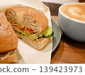 Bagel sandwich and latte 139423973