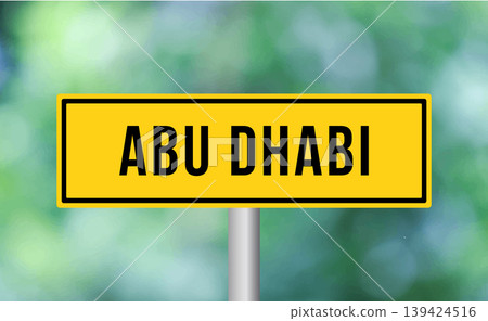 Abu dhabi road sign on blur background Abu dhabi road sign on blur background 139424516