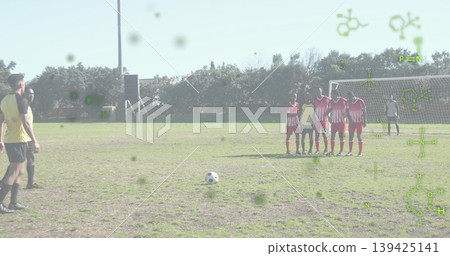 Man in yellow-black jersey taking free kick on pitch, with ball and molecular graphics, copy space Man in yellow-black jersey taking free kick on pitch, with ball and molecular graphics, copy space 139425141